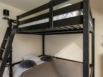 Un ou plusieurs lits dans un hébergement de l'établissement Holiday Home Ti Bonheur by Interhome