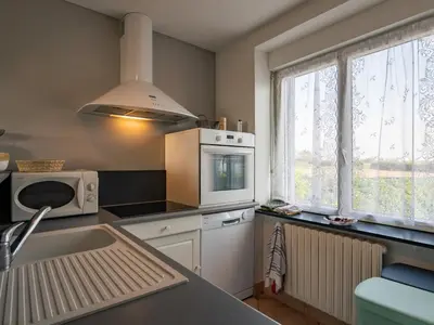 Cuisine ou kitchenette dans l'établissement Holiday Home L'Air du Large by Interhome