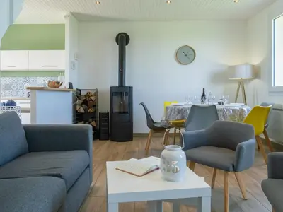 Coin salon dans l'établissement Holiday Home Le Bruit de la Mer - Trouz ar Mor by Interhome