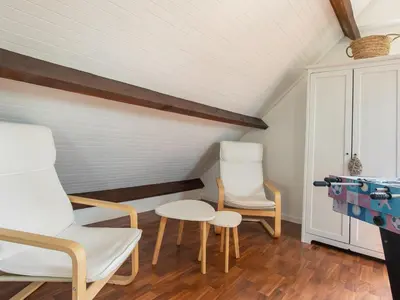 Coin salon dans l'établissement Holiday Home Le Bruit de la Mer - Trouz ar Mor by Interhome