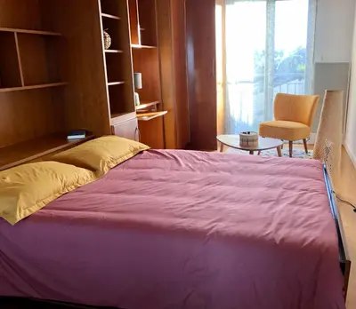 Un ou plusieurs lits dans un hébergement de l'établissement Appartement vue mer à 100m de la plage au centre de Carantec