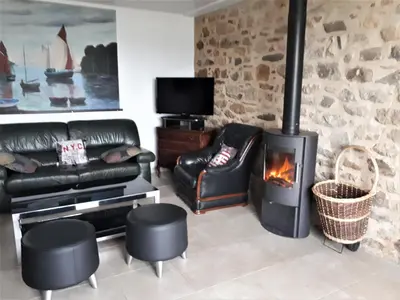 Coin salon dans l'établissement Grande maison familiale,SUPERBE VUE mer,calme,confort,SPA