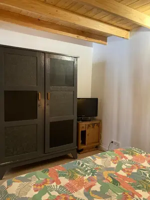 Télévision ou salle de divertissement dans l'établissement AN GOVEL