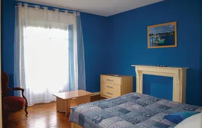 Un ou plusieurs lits dans un hébergement de l'établissement Holiday Home Hent Gwaz Ar Gouez