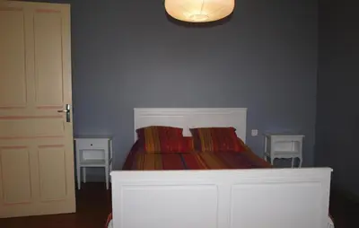 Un ou plusieurs lits dans un hébergement de l'établissement Holiday Home Hent Gwaz Ar Gouez