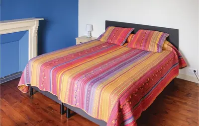 Un ou plusieurs lits dans un hébergement de l'établissement Holiday Home Hent Gwaz Ar Gouez