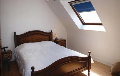 Un ou plusieurs lits dans un hébergement de l'établissement 5 Bedroom Nice Home In Kerlouan