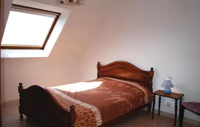 Un ou plusieurs lits dans un hébergement de l'établissement 5 Bedroom Nice Home In Kerlouan
