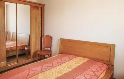 Un ou plusieurs lits dans un hébergement de l'établissement Holiday Home La Digue
