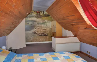 Un ou plusieurs lits dans un hébergement de l'établissement 2 Bedroom Awesome Home In Garlan
