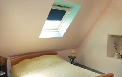 Un ou plusieurs lits dans un hébergement de l'établissement 2 Bedroom Awesome Home In Garlan