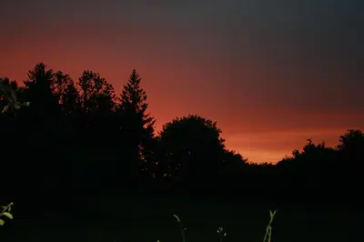 Lever ou coucher de soleil vu de le séjour chez l'habitant ou à proximité