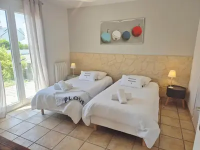 Un ou plusieurs lits dans un hébergement de l'établissement Les gites du bord de mer