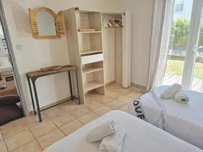 Un ou plusieurs lits dans un hébergement de l'établissement Les gites du bord de mer