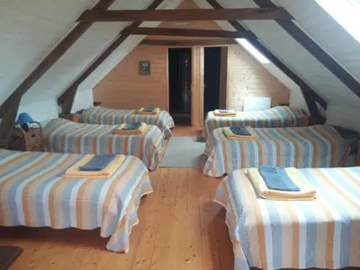 Un ou plusieurs lits dans un hébergement de l'établissement Le Jardin Enchanteur, chaleureuse maison d'hôtes éco-responsable, calme et accueillante