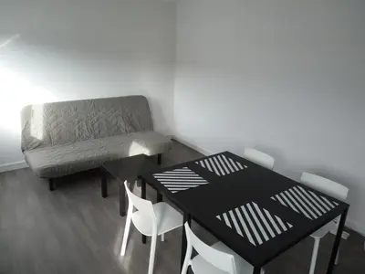Coin salon dans l'établissement Résidence Kerhallet