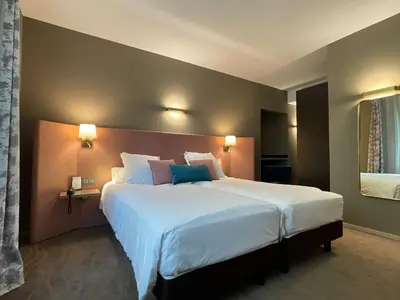 Un ou plusieurs lits dans un hébergement de l'établissement Best Western Plus Hotel Kregenn