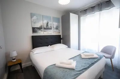 Un ou plusieurs lits dans un hébergement de l'établissement Le Cabestan, appartement proche plage Morgat