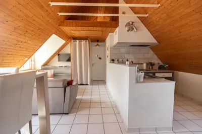 Cuisine ou kitchenette dans l'établissement Le Portzic, Appartement proche plage de Morgat