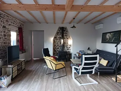 Télévision ou salle de divertissement dans l'établissement Gîte de Rosvern