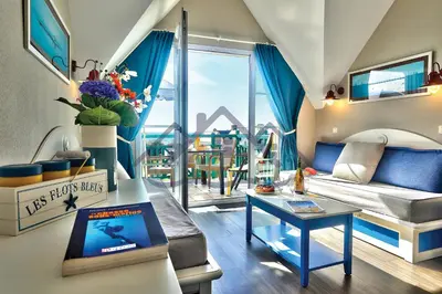 Un ou plusieurs lits dans un hébergement de l'établissement LocaLise au Guilvinec - A28 - Belle vue sur la mer, la piscine et le jardin - - Tout à pied, plages, port, centre, commerces, marché - Wifi inclus - Linge de lit inclus