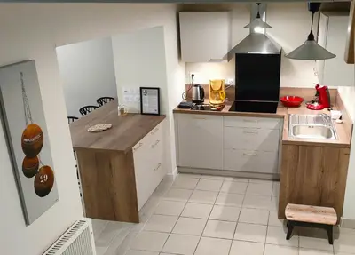 Cuisine ou kitchenette dans l'établissement Cap sur le Sable à Moguériec