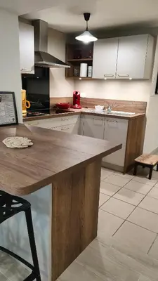 Cuisine ou kitchenette dans l'établissement Cap sur le Sable à Moguériec