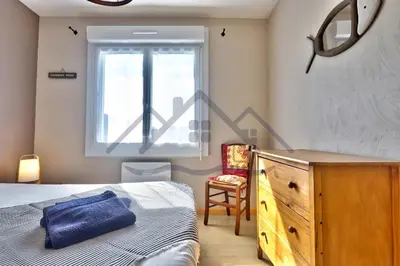 Un ou plusieurs lits dans un hébergement de l'établissement LocaLise - M3B - Souvenir du Guil - Maison de plain-pied avec jardin clos au Guilvinec - Tout à pied, plages, port, centre, commerces, marché - Wif inclus - Linge de lit inclus - Animaux bienvenus