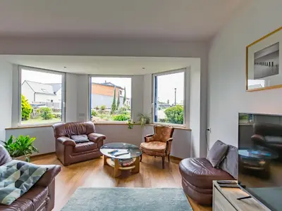 Coin salon dans l'établissement Holiday Home La Grève bleue by Interhome