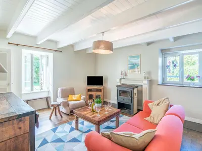 Télévision ou salle de divertissement dans l'établissement Holiday Home Ti ar Stang by Interhome