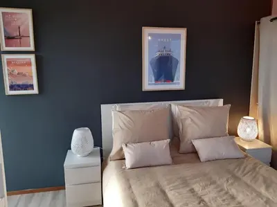 Coin salon dans l'établissement Logement 80 m2 avec terrasses entre les deux abers
