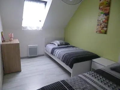 Un ou plusieurs lits dans un hébergement de l'établissement gite au calme centre finistère jardin clos