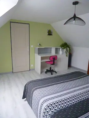 Un ou plusieurs lits dans un hébergement de l'établissement gite au calme centre finistère jardin clos