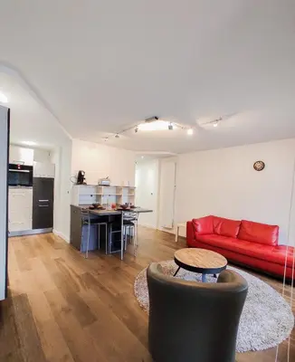Cuisine ou kitchenette dans l'établissement T3 au centre ville avec balcon, parking gratuit