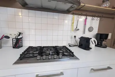 Cuisine ou kitchenette dans l'établissement Longère rénovée avec accès direct à la mer