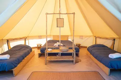 Un ou plusieurs lits dans un hébergement de l'établissement Lodg'ing Nature Camp Presqu'île Crozon