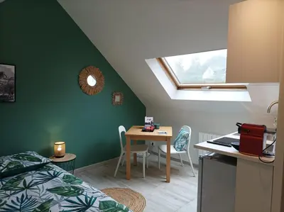 Un ou plusieurs lits dans un hébergement de l'établissement LE NID 2 QUIMPER BY Nid'Ouest