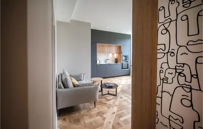 Coin salon dans l'établissement Gorgeous Apartment In Concarneau