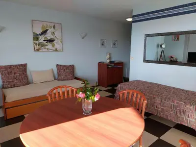 Coin salon dans l'établissement Apartment in Cornouaille near Sandy Beach