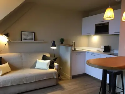 Cuisine ou kitchenette dans l'établissement APPART-STUDIOS VUE MER PANORAMIQUE ST GUENOLE Côté Mer