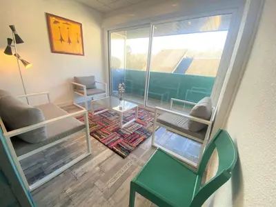 Coin salon dans l'établissement Duplex à Combrit: plage à pied, piscine chauffée et tennis - FR-1-481-101