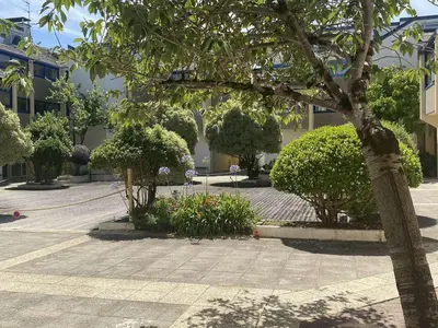 Jardin de l'établissement Duplex à Combrit: plage à pied, piscine chauffée et tennis - FR-1-481-101
