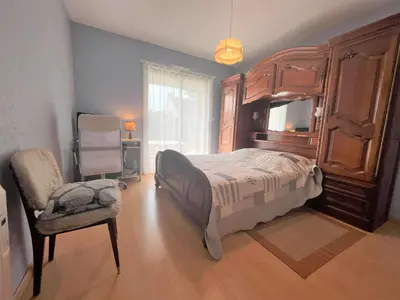 Un ou plusieurs lits dans un hébergement de l'établissement Maison familiale à Fouesnant avec jardin clos, proche plages et centre-ville - FR-1-481-103