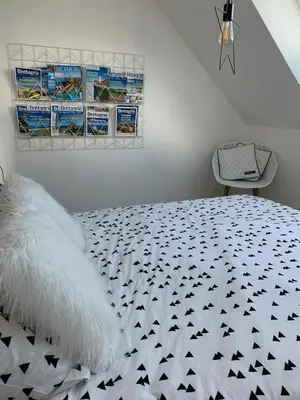 Un ou plusieurs lits dans un hébergement de l'établissement Cabana Lampaul