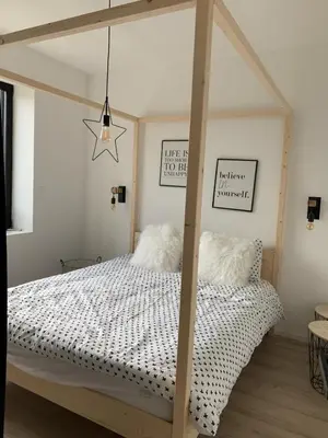 Un ou plusieurs lits dans un hébergement de l'établissement Cabana Lampaul