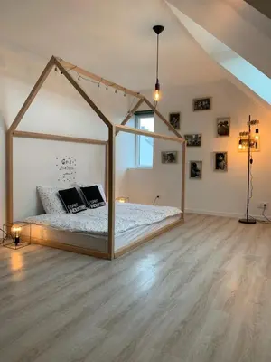 Un ou plusieurs lits dans un hébergement de l'établissement Cabana Lampaul