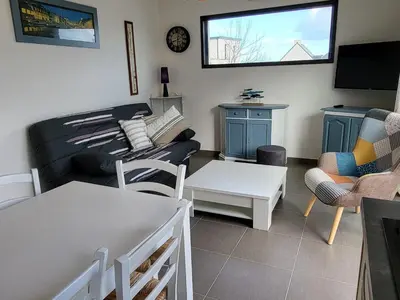 Coin salon dans l'établissement LES EMBRUNS MARINE