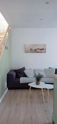 Coin salon dans l'établissement L'Escale Bretonne 6 personnes, proche mer et centre ville, jardin privé et clos