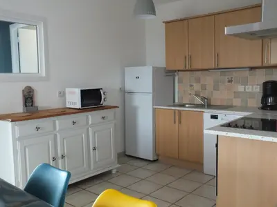 Cuisine ou kitchenette dans l'établissement LES HAUTS VENTS