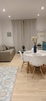 Coin salon dans l'établissement L'Escale Bretonne 4 personnes, proche mer, jardin privé clos et indépendant, appartement en rez de chaussé